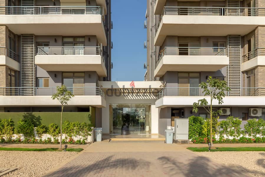 A two-room apartment at a special price in the heart of the First Settlement, direct on Suez Road, in a compound with full services and facilities 12