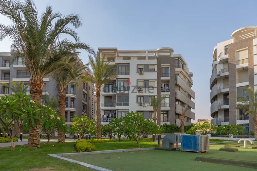 Apartment for sale in Taj City Compound in front of Cairo International Airport, in installments over 8 years 12