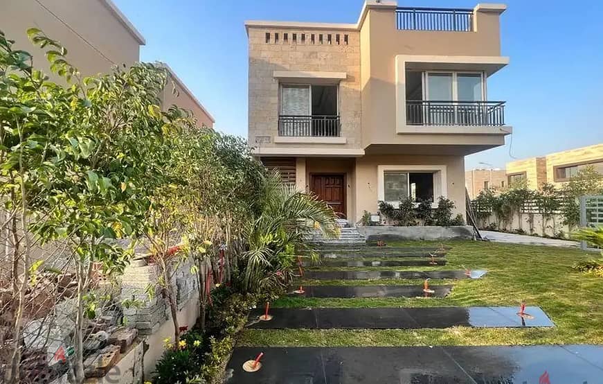 independent villa 240m for sale in front of Cairo Airport in Taj City Compound with two facades on the Suez and Ring Roads 2