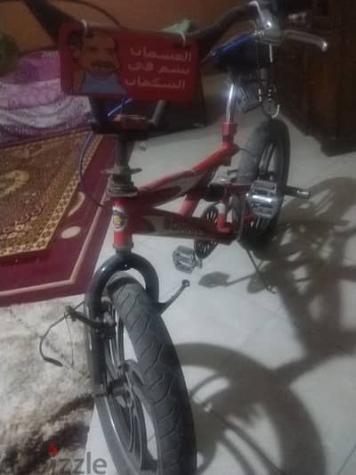 عجله جوما اصليه شبه جديده بمساعدين وكوتشات اصليه العجله مقاس 21 لحد٢٤
