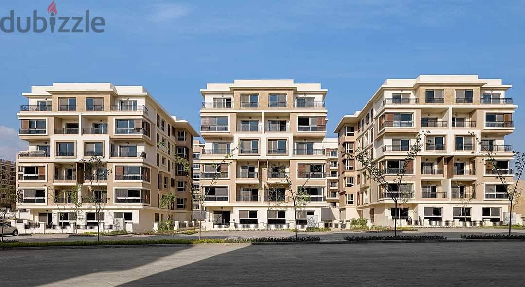 Apartment for sale in front of Cairo Airport, area 225 meters + roof 125 meters, with a 39% discount on cash payment in Taj City, New Cairo 1