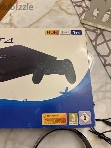 PS4 Slim 1TB + Extra Controller 11