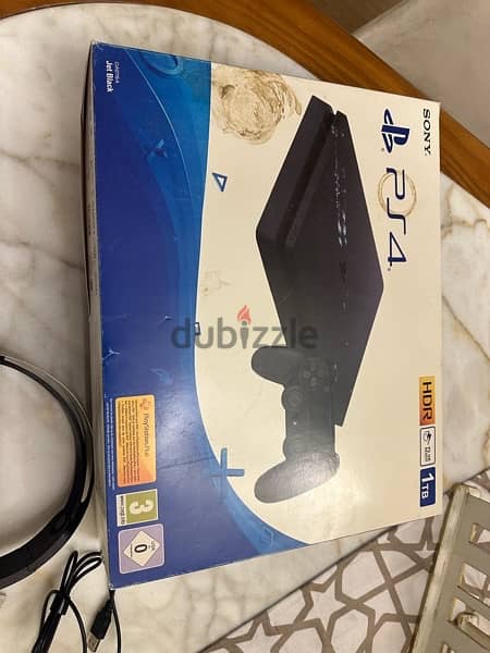 PS4 Slim 1TB + Extra Controller 12