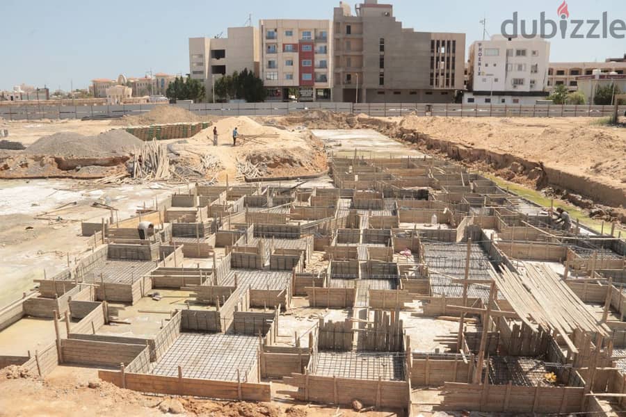 30% dp. Perfect location, new project in El Kawthar, next to the Mamsha promenade street with 3 pools 5