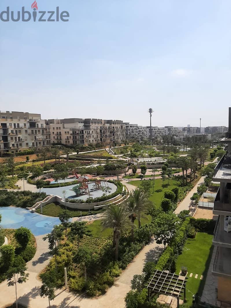 amazing apartment for rent in eastown sodic beside auc - spacious garden view 14
