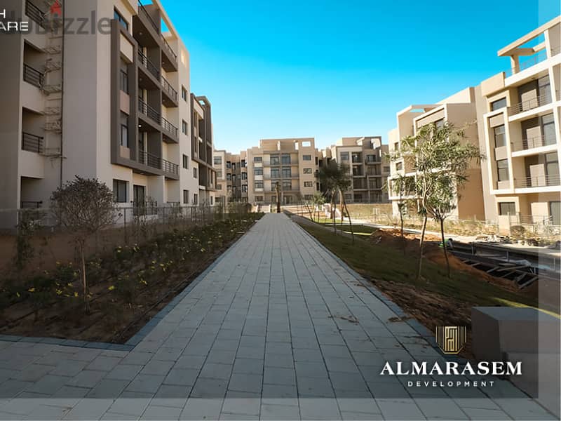 Own your immediate 3-bedrooms apartment in New Cairo in Fifth Square Compound In installments over the longest payment plan View on the landscape 1