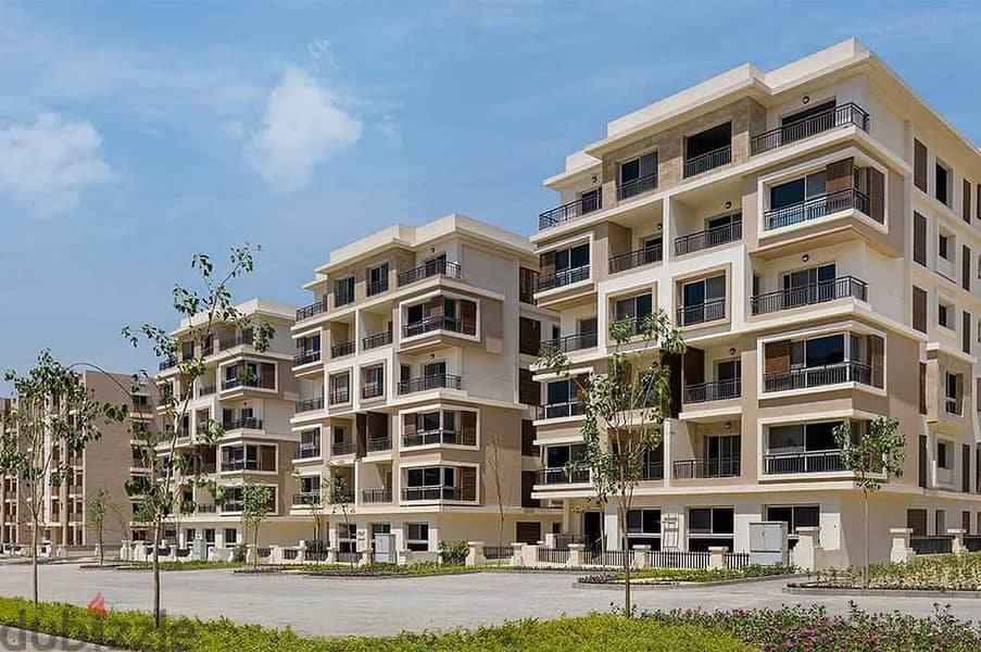 Apartment for sale in front of Cairo Airport, 168 meters + garden 219 meters, with a 39% discount on cash payment in Taj City, New Cairo, Taj City 1