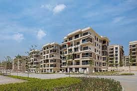 Apartment for sale in front of Cairo Airport, 168 meters + garden 219 meters, with a 39% discount on cash payment in Taj City, New Cairo, Taj City 3