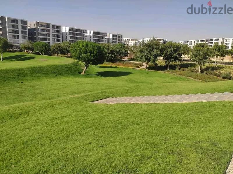 In front of Cairo Airport and Mirage City, a distinctive apartment with a clear sea corner, 166 square meters, for sale in Taj City Compound, New Cair 9