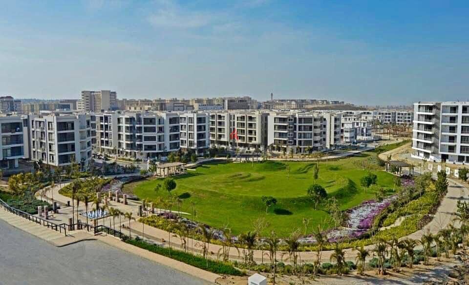 In front of Cairo Airport and Mirage City, a distinctive apartment with a clear sea corner, 166 square meters, for sale in Taj City Compound, New Cair 10