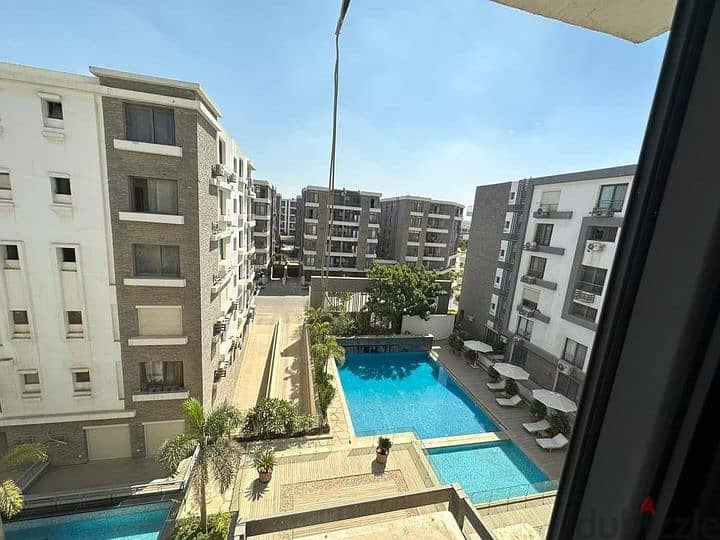 For sale, an apartment in the largest and most distinguished compound in the heart of the Fifth Settlement, next to Cairo Airport, with a 10% down pay 7
