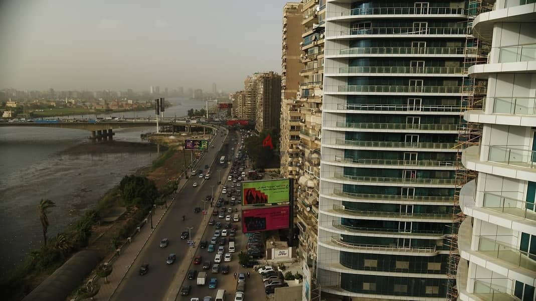 شقة فندقية فيو بانورامي ع النيل جاهزة للسكن بخدمات هليتون تشطيب الترا سوبر لوكس ابراج النيل بيرل NILE PEARL 4