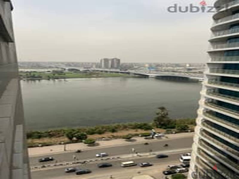 A hotel apartment with a panoramic view on the Nile, READY TO MOVE NOW!!, with Hilton services, ultra super luxury finishing, Nile Pearl Towers 6