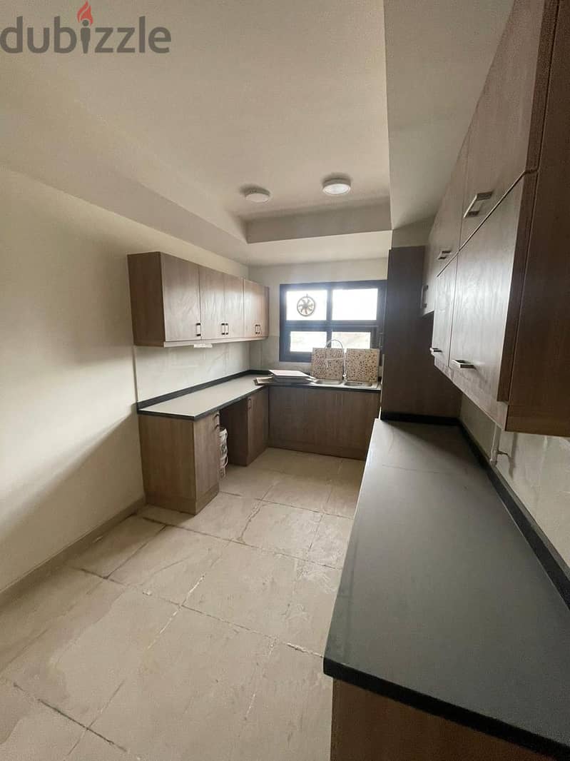 Apartment 238m with garden for rent Mivida crescent Kitchen and ac's 6