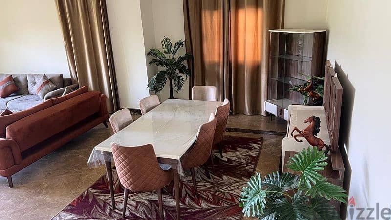 Fully furnished in Mivida لشقة ارضي بحديقة مفروشة و مكيفة بالكام 14