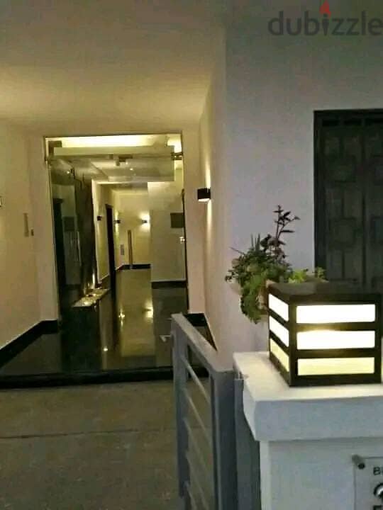 Duplex 158 meters with garden for sale in Taj City Compound, New Cairo, in front of Cairo Airport, at a special price and installments up to 8 years w 2
