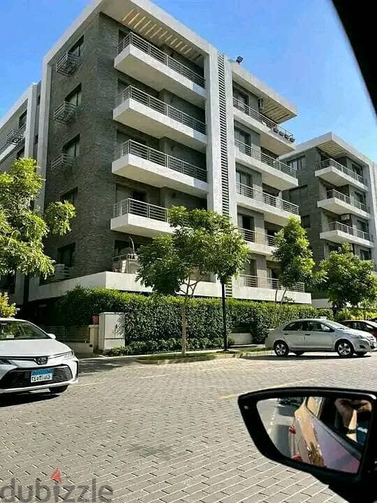 Duplex 158 meters with garden for sale in Taj City Compound, New Cairo, in front of Cairo Airport, at a special price and installments up to 8 years w 15