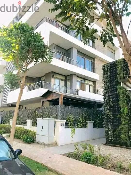 Duplex 158 meters with garden for sale in Taj City Compound, New Cairo, in front of Cairo Airport, at a special price and installments up to 8 years w 16