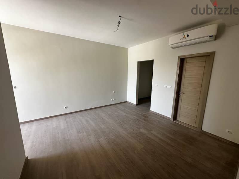 semi furnished Apartment 3rooms + first use for rent in Mivida Avenues new cairo 1