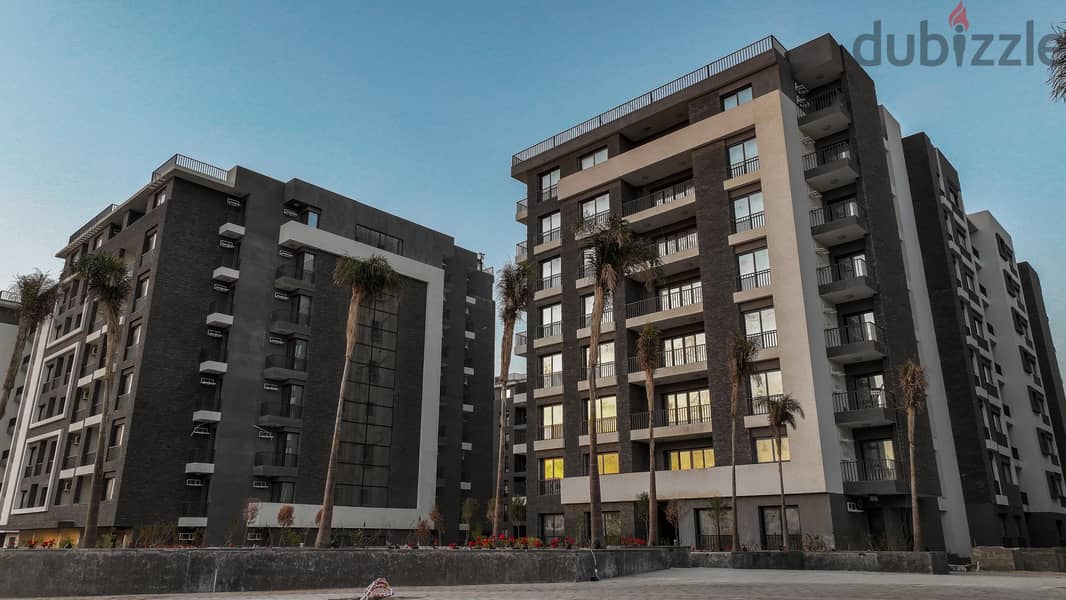 Immediately receive your apartment with a garden view and a swimming pool in the Castle Landmark Compound, the Administrative Capital, in the R7 Distr 12