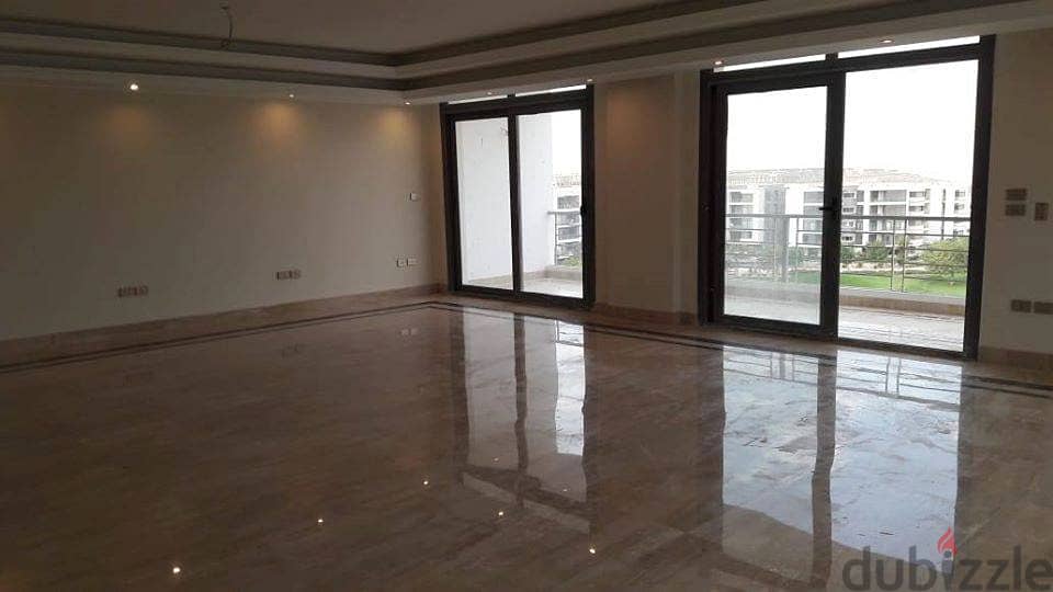 With a down payment of 460,000, own this luxurious 129-square-meter apartment featuring two bedrooms with a very distinctive view overlooking the land 1