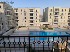 semi furnished Apartment 2rooms for rent in Mivida Boulevard  view pool 0