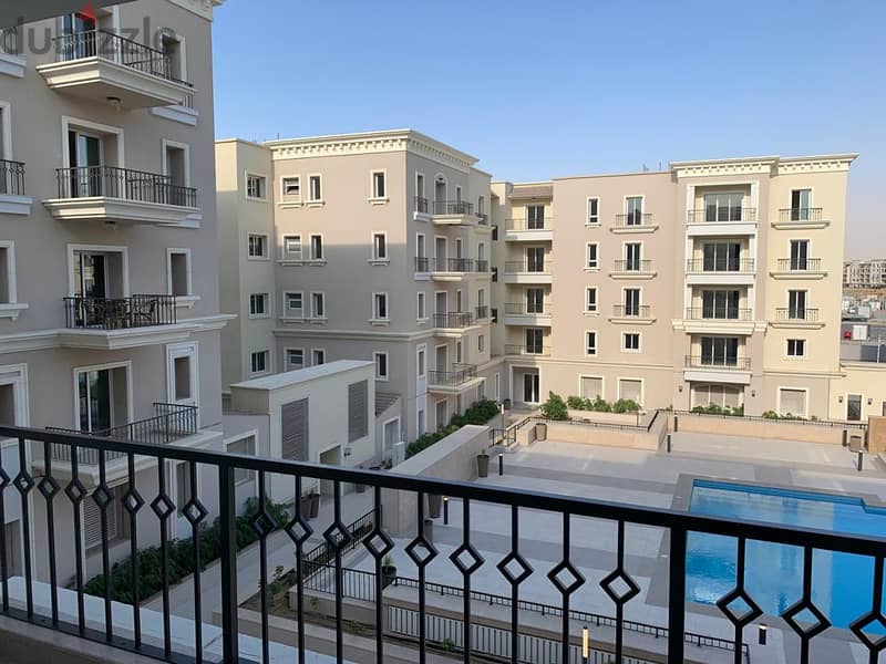 semi furnished Apartment 2rooms for rent in Mivida Boulevard  view pool 14
