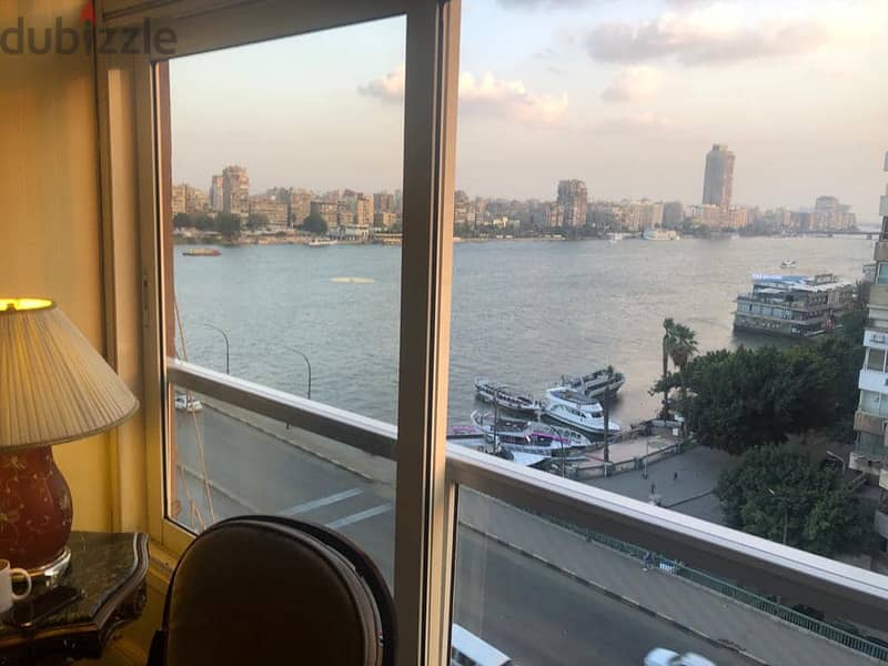 I own a first-row apartment on the Nile, immediate receipt, fully finished + ACs, with an investment contract 8