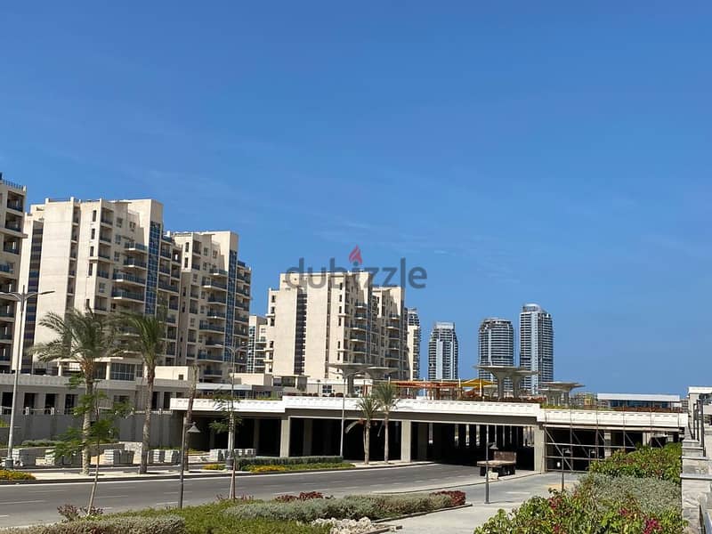 An investment commercial store of 72 meters with facilities in Downtown, New Alamein City, with a view of Al Alamein Towers and Lagoon, at the highest 1
