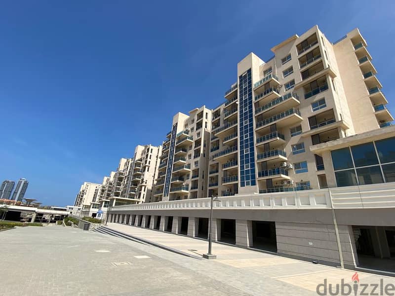 An investment commercial store of 72 meters with facilities in Downtown, New Alamein City, with a view of Al Alamein Towers and Lagoon, at the highest 7