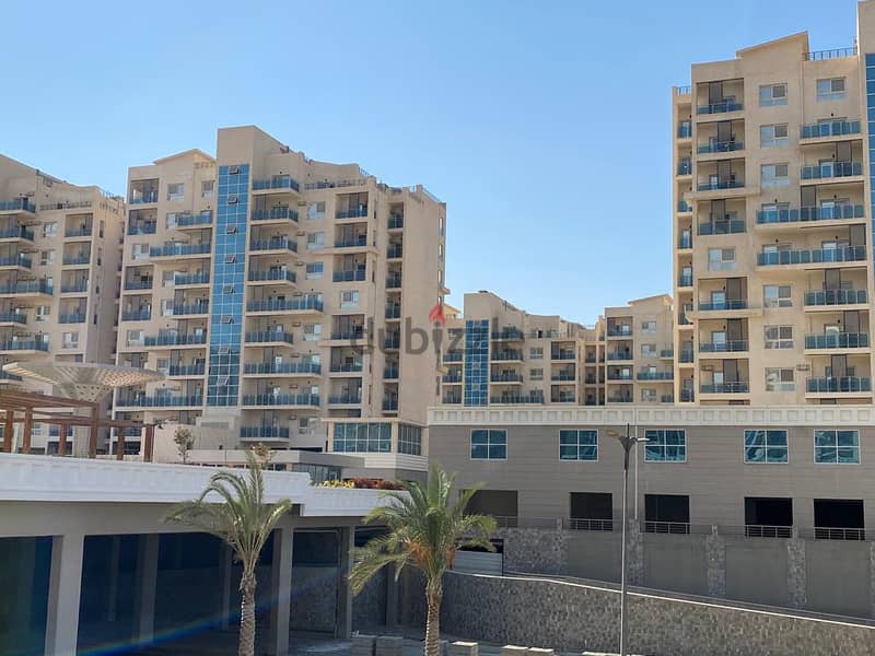 An investment commercial store of 72 meters with facilities in Downtown, New Alamein City, with a view of Al Alamein Towers and Lagoon, at the highest 8