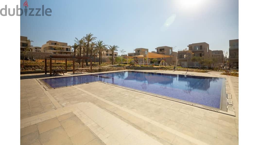 Apartment 70m for sale in palm hills new cairo fully finished with 10% down payment بالم هيلز 7