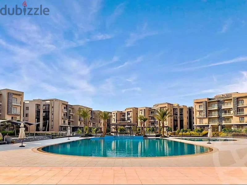 Apartment in Galleria Moon Valley Compound, Fifth Settlement, with a view open to a swimming pool 2