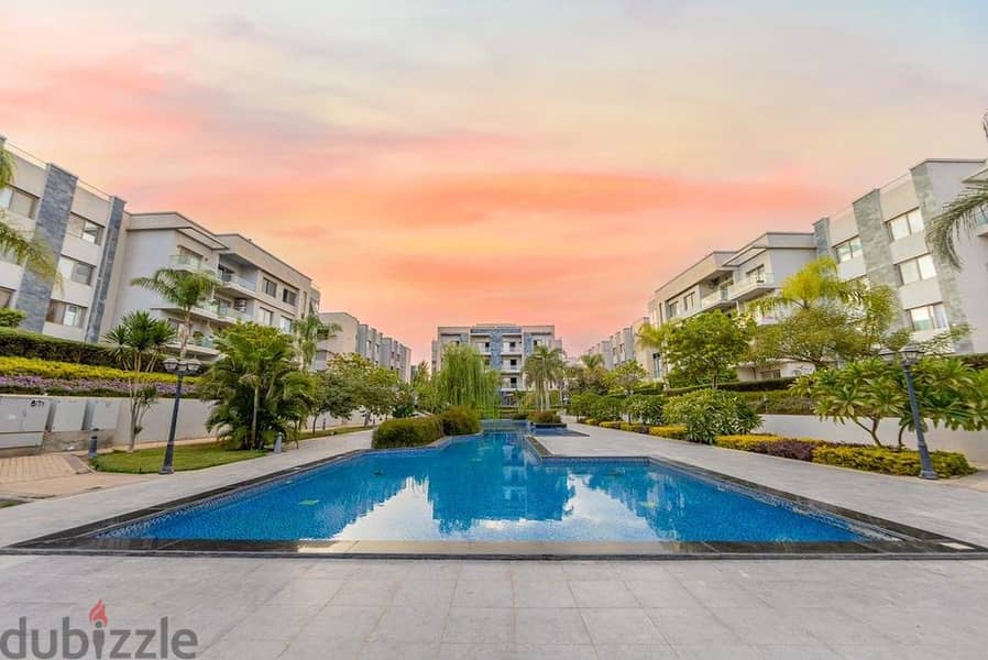Apartment in Galleria Moon Valley Compound, Fifth Settlement, with a view open to a swimming pool 8