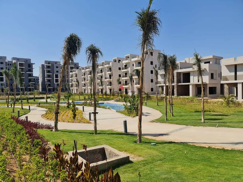 Apartment with garden in Sun Capital October compound, minutes from Mall of Egypt, area of ​​149 sqm + 147 sqm garden 1
