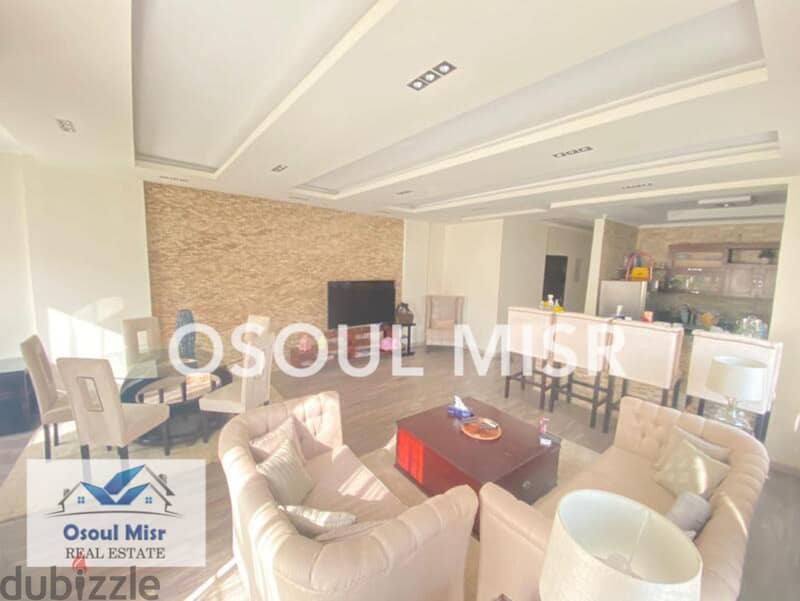 Apartment for sale in Mohandiseen, fully equipped, overlooking a garden 1