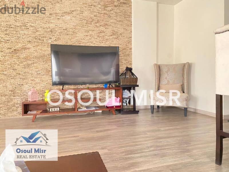 Apartment for sale in Mohandiseen, fully equipped, overlooking a garden 2