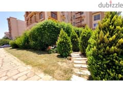 Ground floor apartment with a private garden for sale in the best location in Madinaty, B3.