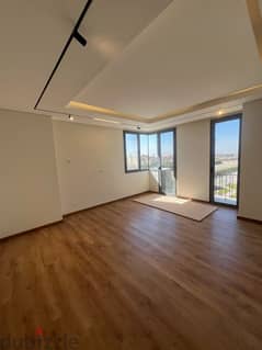 ready to move apartment 144 sqm finished with kitchen and air conditioners in a location in Al Maqsad a view of an iconic tower next to madinaty o