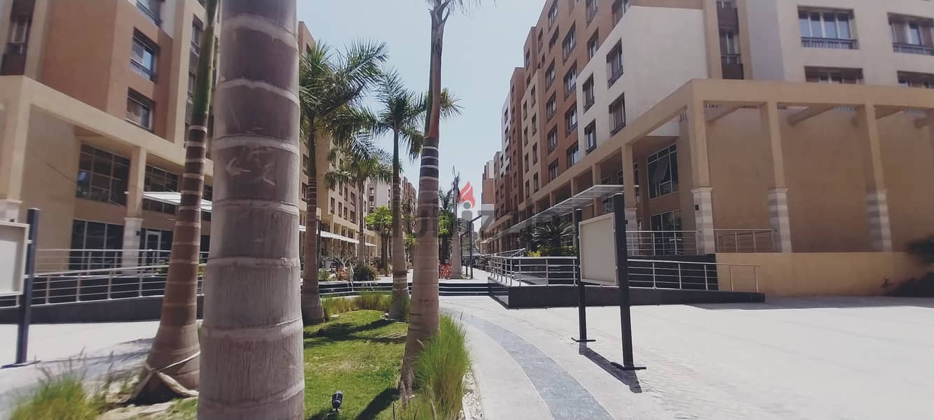 ready to move apartment 144 sqm finished with kitchen and air conditioners in a location in Al Maqsad a view of an iconic tower next to madinaty o 2