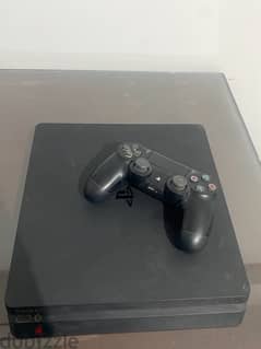 ps4 slim with a controller and games 0