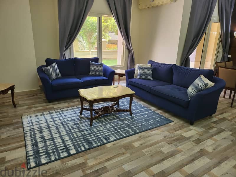Fully-furnished apartment 146 m. + 100 m. garden for rent ultra super lux in prime location The Village Fifth Settlement New Cairo 1