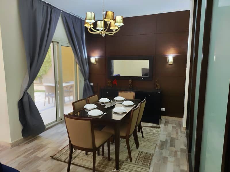 Fully-furnished apartment 146 m. + 100 m. garden for rent ultra super lux in prime location The Village Fifth Settlement New Cairo 20