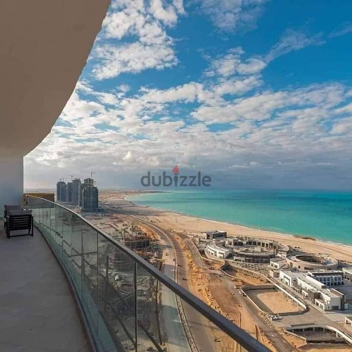 A finished apartment ready for delivery for sale with a fantastic view on the Lagoon and El Alamein Towers in the New City of El Alamein in the Latin 8