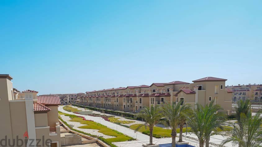 Townhouse villa with a 15% down payment and comfortable installments over 6 years, a prime location in Sheikh Zayed 4