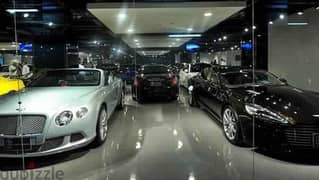 Car showroom for sale, fully finished, with air conditioners, in the first mega mall on Suez Road, in installments over 6 years. 0