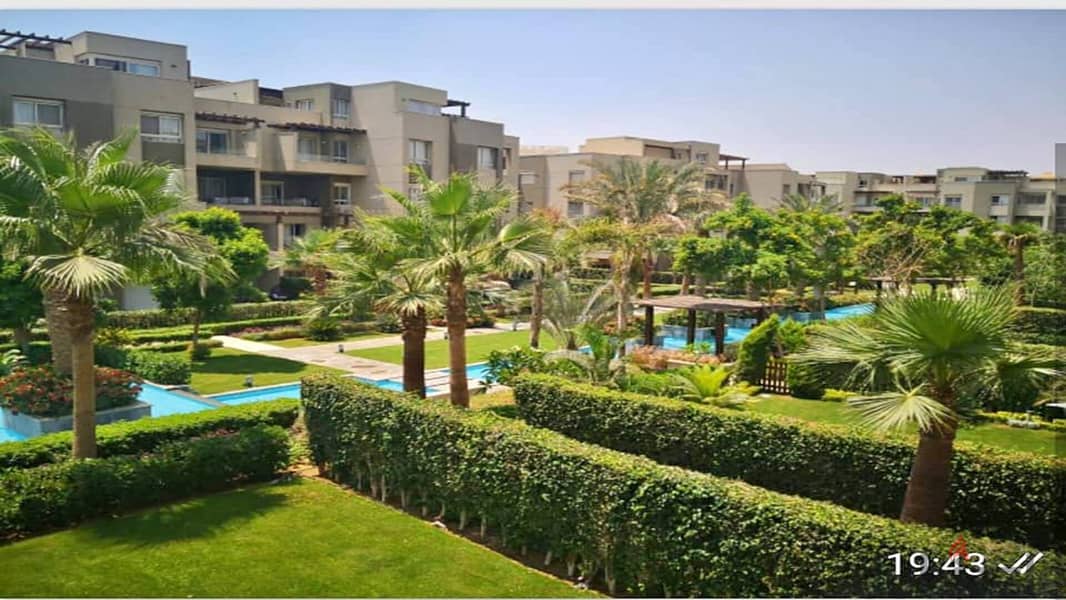 Apartment for sale in the heart of the community in Swan Lake Hassan Allam Compound, directly on Suez Road 8
