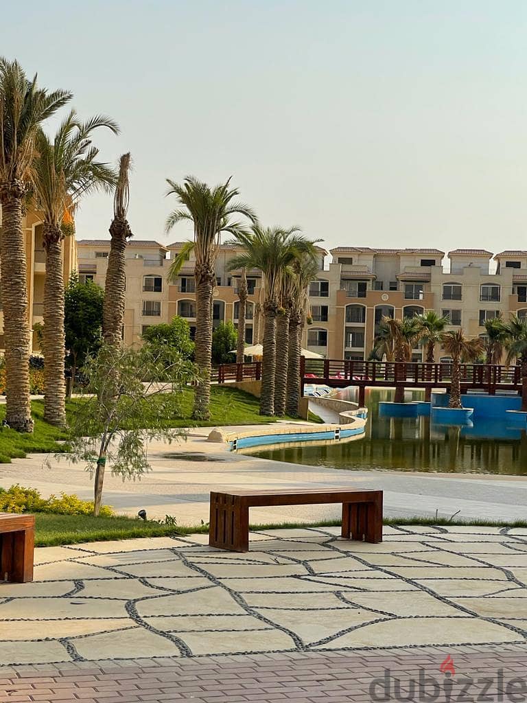 Apartment for sale in installments, immediate receipt, in Stone Residence, New Cairo 2