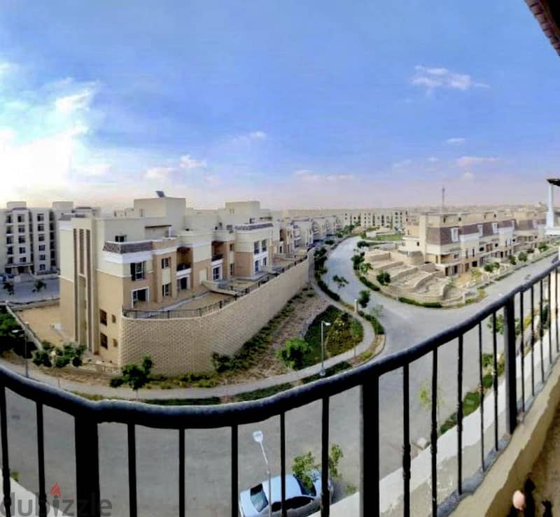For sale next to Al-Shorouk, apartment 112 m + terrace on view and landscape in Sarai New Cairo, installments for 8 years 1