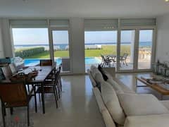 Chalet with garden for sale, modern finishing, direct sea view in the North Coast